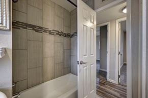 Colorado Springs house for rent - A white door is open to a hallway.