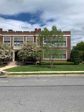 Reading apartment for rent - A brick building with a tree in front of it.