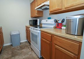 Mountain Home apartment for rent - A kitchen with a stove, oven, microwave, and toaster.