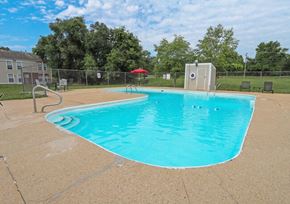 Mountain Home apartment for rent - A small pool with a diving board and a small building next to it.