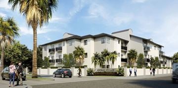 Hialeah apartment for rent - A street view of a residential area with a building named "King's Village".
