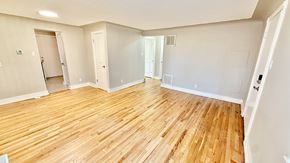 Lakewood apartment for rent - A kitchen with a black fridge, stove, and dishwasher.