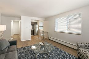Denver apartment for rent - A kitchen with wooden cabinets and stainless steel appliances.