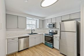 Longmont apartment for rent - A kitchen with a refrigerator, sink, and oven.