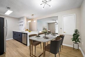 Cleveland apartment for rent - A dining room with a table set for six.