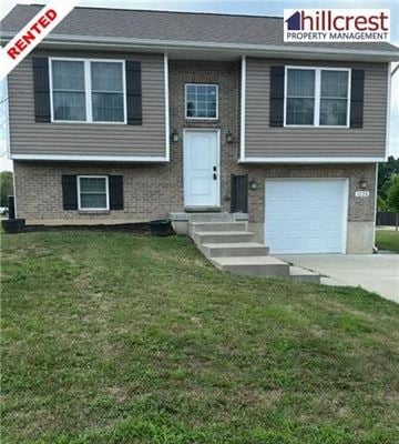 Walton house for rent - A two-story house with a garage is for rent.