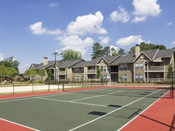 The arbors at breckinridge apartment homes lighted tennis court