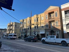 Atlantic Highlands apartment for rent - A street scene with a white truck parked on the side of the road.