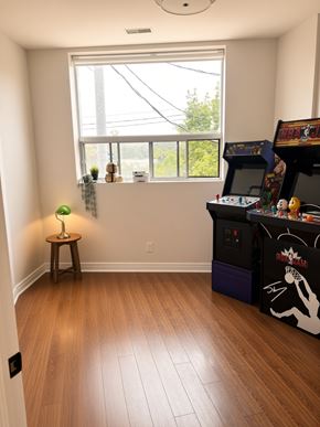 Toronto apartment for rent - A room with a basketball arcade machine.