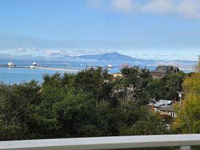 Richmond apartment for rent - A view of a mountain from a balcony.