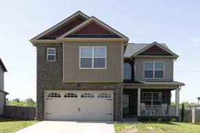 Clarksville house for rent - A two-story house with a garage on the ground floor.