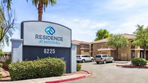 Phoenix apartment for rent - A sign for Residence at McDowell with a blue background and white text.