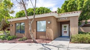 Phoenix apartment for rent - A small building with the word "OFFICE" on the top.