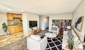 Lakewood apartment for rent - A kitchen with a fan and brown tiles.