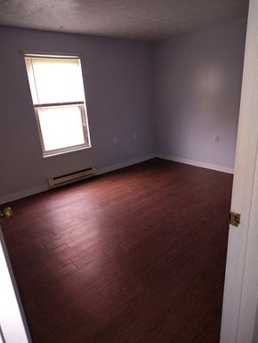 Scottdale apartment for rent - A room with a window and wooden flooring.
