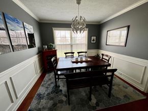 Prospect house for rent - A dining room with a table and chairs.