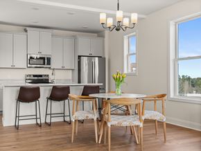 South Burlington apartment for rent - A kitchen with a table and chairs.