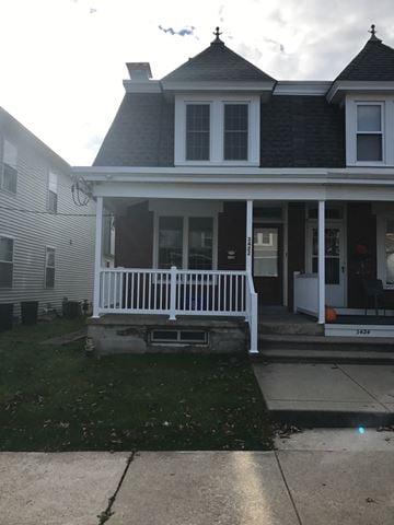 Laureldale house for rent - A house with a porch and a white railing.