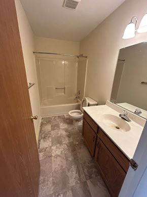 Shillington apartment for rent - A bathroom with a toilet, sink, and shower.