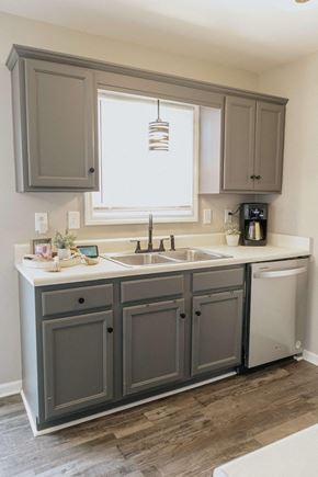 Clarksville house for rent - A kitchen with a sink and a window.