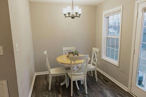 Clarksville house for rent - A dining room with a table and chairs.