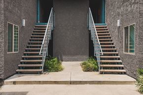 Van Nuys apartment for rent - A house with a staircase leading to the front door.