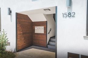 Eagle Rock apartment for rent - A white house with the number 1582 on the wall.