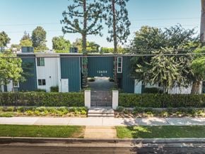 Studio City apartment for rent - A green building with the number 1245 on it.