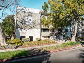 Pasadena apartment for rent - A building with a large sign on the side of it.