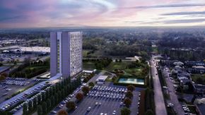 Southgate apartment for rent - A modern building with a parking lot in front of it.