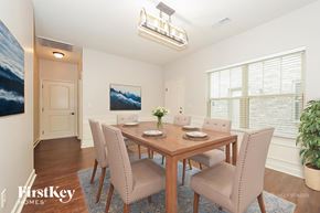 Murfreesboro house for rent - A dining room with a wooden table and chairs.