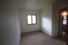 Whitefish apartment for rent - A room with a window and a door.