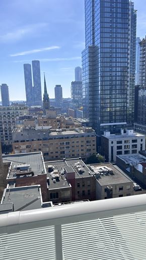 Toronto apartment for rent - A cityscape with a mix of modern and older buildings.