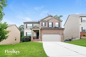 Winder house for rent - A house with a garage is shown in the image.