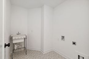 Lake Elmo house for rent - A white bathroom with a sink and a white cabinet.