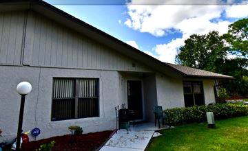 Fort Pierce house for rent - A house with a red carpet and a white wall.