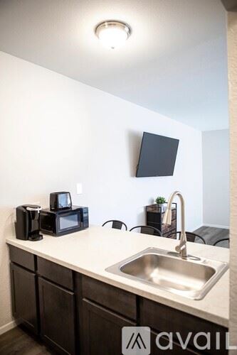 Sierra Vista apartment for rent - A kitchen with a sink and a microwave on the counter.