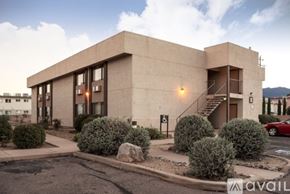 Sierra Vista apartment for rent - A modern building with a parking lot in front.