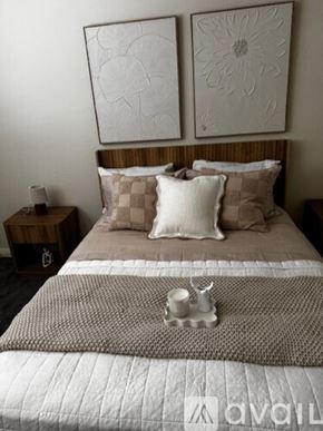 Sierra Vista apartment for rent - A bedroom with a bed, dresser, and window.