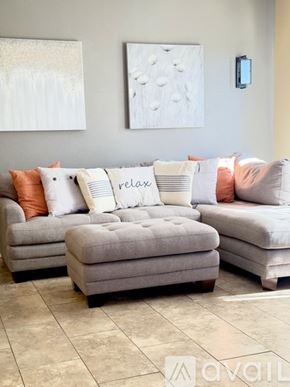 San Dimas townhouse for rent - A bedroom with two beds and a nightstand in between.