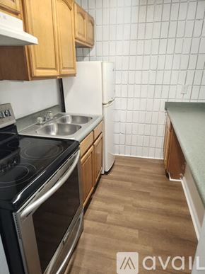 Dalton apartment for rent - A room with a window and a wall covered in white tiles.
