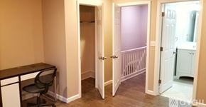 Philadelphia house for rent - A room with a desk and a chair in it.