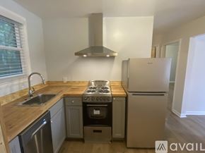 Nashville apartment for rent - A kitchen with a stove, oven, and refrigerator.