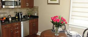 Norwalk apartment for rent - A kitchen with a dishwasher, microwave, and sink.