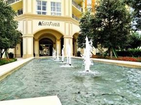 West Palm Beach apartment for rent - A fountain in front of a building with the name City Plaza on it.