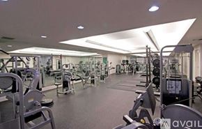 West Palm Beach condo for rent - A gym with a variety of equipment including treadmills, weights, and exercise machines.