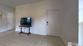 San Marcos house for rent - A bathroom with a sink and mirror in a white cabinet.