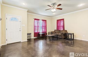 Waco house for rent - A dining room with a wooden table and chairs.