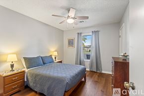 Sherwood house for rent - A bedroom with a bed and a window.