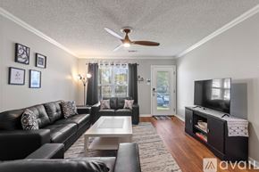 Sherwood house for rent - A kitchen with wooden cabinets and stainless steel appliances.
